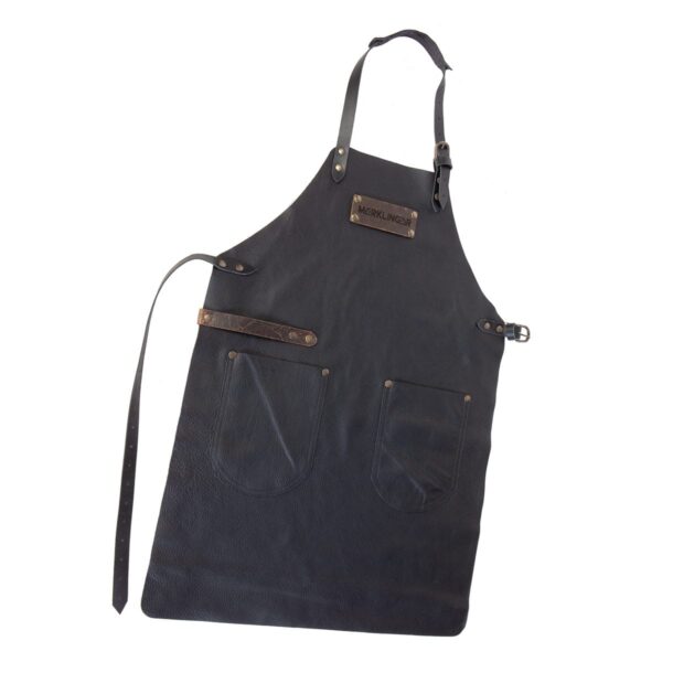 „MERKLINGER Lederschürze in Schwarz – handgefertigt, verstellbares Nackenband, zwei Fronttaschen, Geräteschlaufe, genietet.“